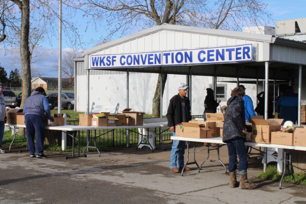 Aaron McNeil House volunteers distribute food to 1,000 Christian County