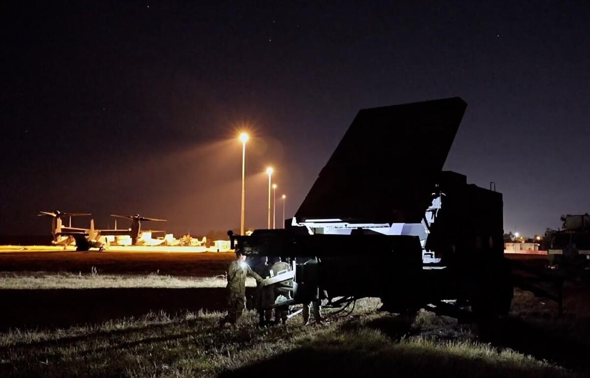 U.S. Army Soldiers from 1st Battalion, 1st Air Defense Artillery Regiment, 38th Air Defense Artillery Brigade emplace a Patriot radar system under night conditions, July 19, 2025. (Contributed by U.S. Army)