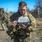 A soldier with the 101st Airborne Division operates the flight controls for an unmanned aircraft system (UAS) during a live-fire exercise at Fort Campbell on March 12, 2026. (U.S. Army, Spc. Sandy Vera)