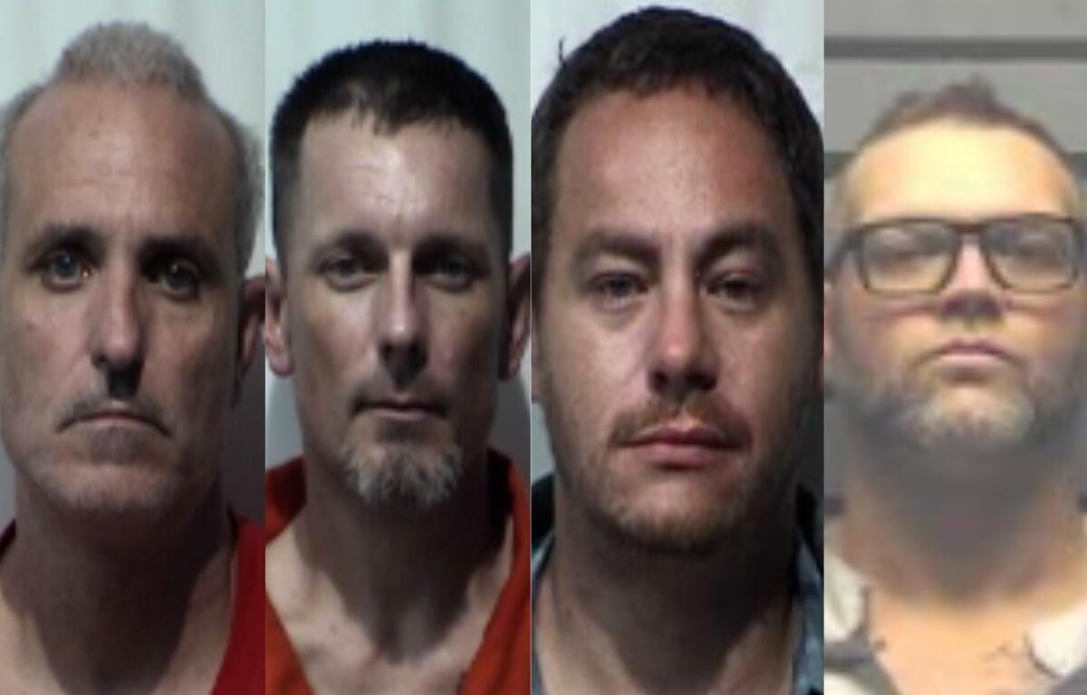 Four mugshots of adult men facing forward in jail attire, shown side by side in a lineup-style collage.