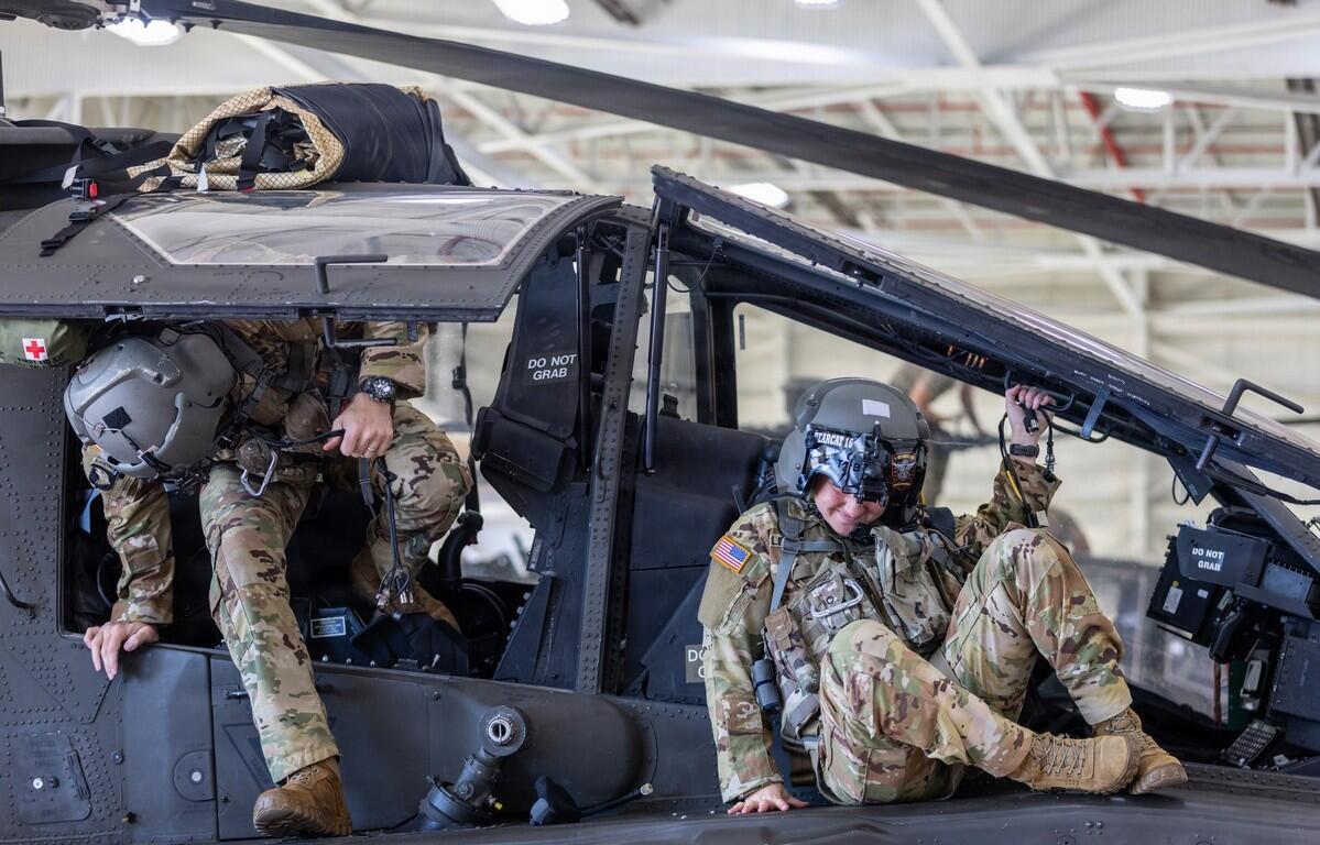 A 101st Combat Aviation Brigade pilot conducts egress testing from an AH-64 Apache helicopter while equipped with the Advanced Inflight Relief Universal System (AIRUS) at Fort Campbell, Oct. 5, 2026. (U.S. Army photo by Capt. Andrew Lightsey IV)