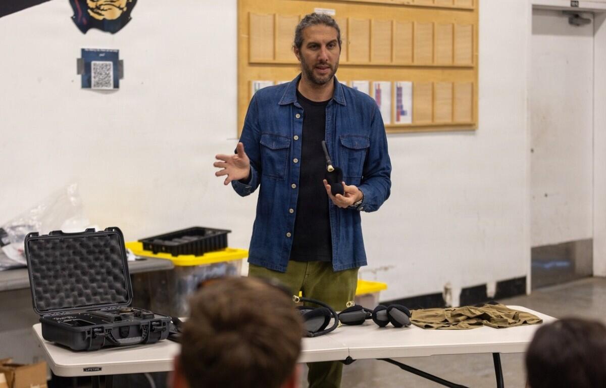 Colt Seman, CEO of AIRION, briefs 101st Combat Aviation Brigade pilots on the Advanced Inflight Relief Universal System (AIRUS) before flight testing begins at Fort Campbell, Kentucky, Oct. 5, 2026. (U.S. Army photo by Capt. Andrew Lightsey IV)